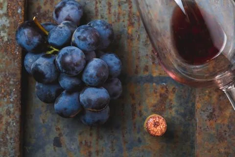 Wine concept - wine, grape on rustik dark background. Top wiew Stock Photos