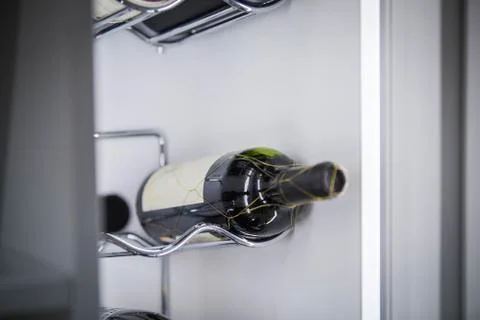 A wine cooler with a bottle. Stock Photos
