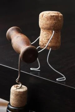 Wine corks and bottle with corkscrew Foto stock