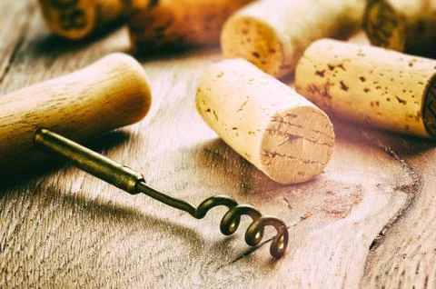 Wine corks and corkscrew Stock Photos