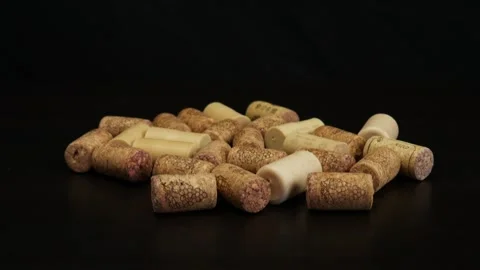 Wine corks on black table 스톡 동영상 105745371