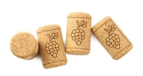 Wine corks with grape images on white background, top view Stock Photos