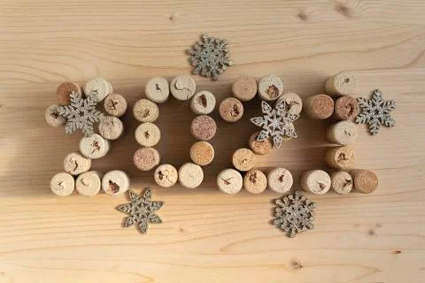 Wine corks stacked as the date of the 2020 retro style. Christmas background Stock Photos
