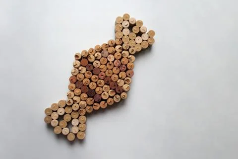 Wine corks wrapped candy composition Stock Photos