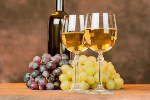 Wine cups and grape Stock Photos