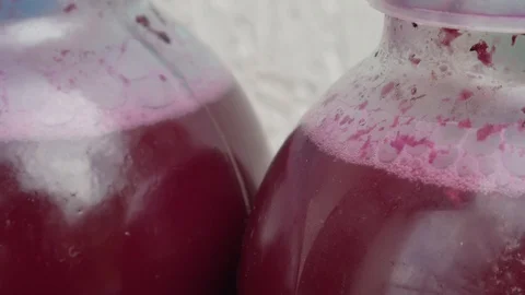 Wine fermentation Process Close-up, Wine Making, Wine in Special jar Close-up Stock Footage 117184889