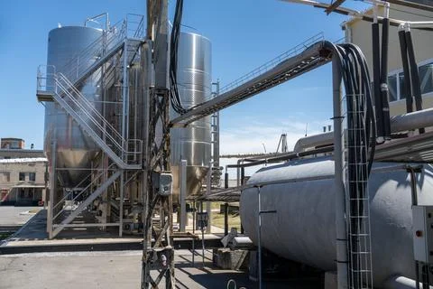 Wine fermentation tanks assembled into a module for outdoor placement Stock Photos
