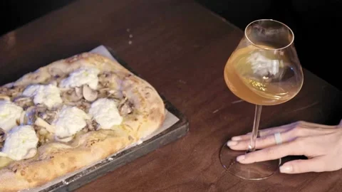 Wine forms beautiful wave. Rotating glass of wine Stock Footage 170233085