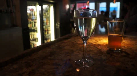 Wine Glass On A Bar Stock Footage 24184397