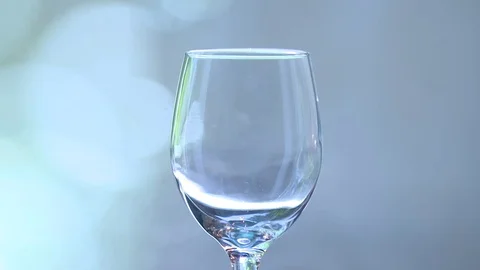 Wine Glass being Filled Stock Footage 70329340