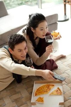 Wine glass box Remote control Red wine glass Asian Oriental figures Carpet Take Stock Photos