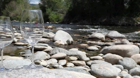 Wine glass empty by river Stock Footage 35761472