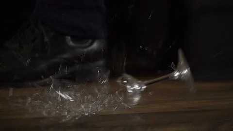 Wine Glass falling and breaking on the floor in slow motion Stock Footage 101311065