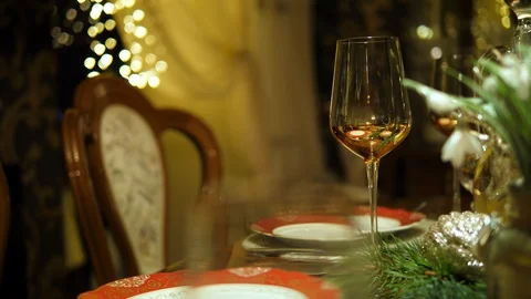 Wine Glass. Table setting served. Christmas dinner family. Stock-Footage 129043590