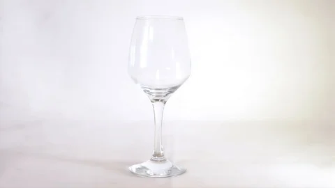 The wine in the glass on white background Stock Footage 101663287