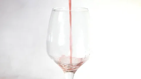 The wine in the glass on white background Video stock 101664017