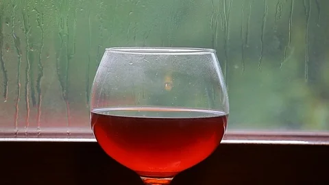 Wine glass window rain drop hd footage nobody Stock Footage 111380693