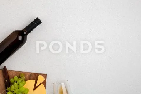 Wine, glasses and corkscrew over white background. Top view Stock Photos
