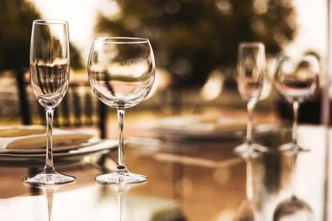 Wine glasses and table setup, wedding guest table, reception layout Stock Photos