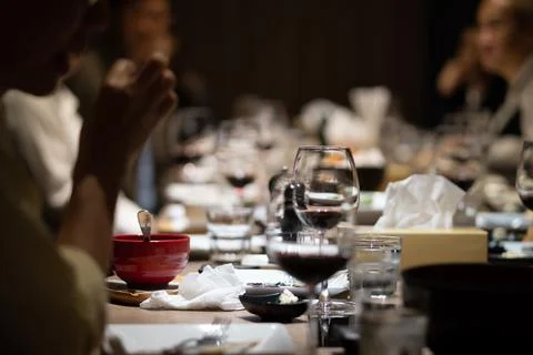 Wine glasses on the dining table in a fine restaurant Stock Photos