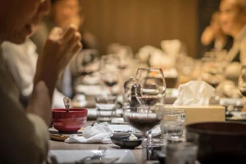 Wine glasses on the dining table in a fine restaurant Stock Photos