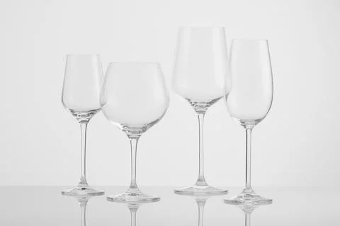 Wine glasses on a light background Stock Photos