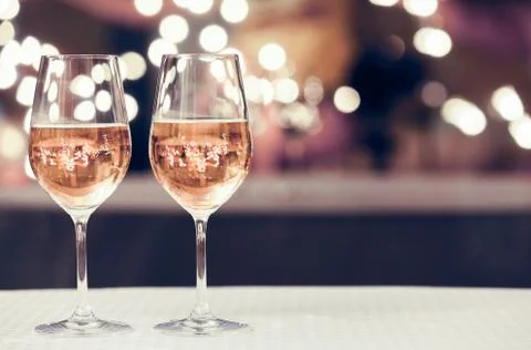 Wine glasses in a restaurant setting. Stock Photos