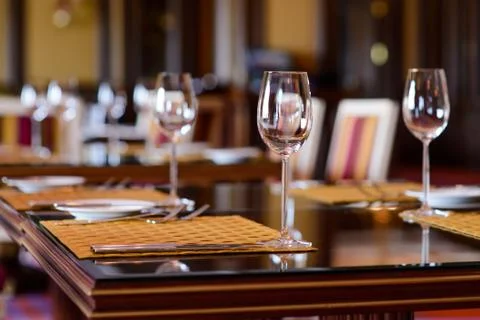 Wine glasses on served table Stock Photos