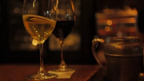Wine glasses on table Stock Footage 82844157