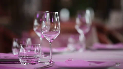 Wine glasses on a table in a restaurant Stock Footage 49722823