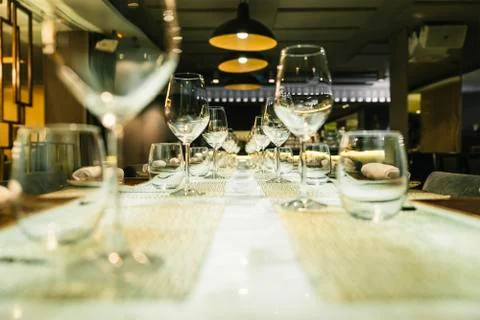 Wine glasses on a table in a restaurant Stock Photos