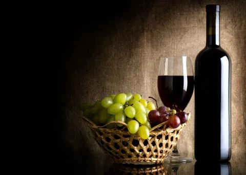 Wine on the old background Stock Photos