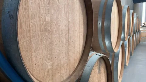 Wine Or Whiskey Barrels Stacked At The Winery. Stock Footage 254047075