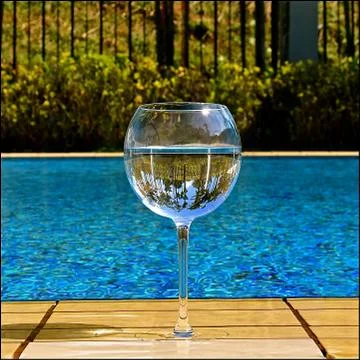 Wine by the pool Stock Photos