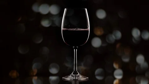 Wine pour slow motion. Warm bokeh, slow motion shot. Stock Footage 120382804