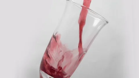 Wine is poured into an empty glass Stock Footage 102112063