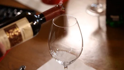 The wine is poured into a glass Stock Footage 113270986