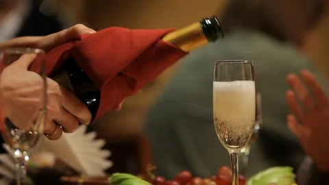 Wine is poured into glasses Stock Footage 100239261