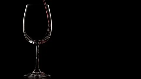 Wine pouring in slow motion. Isolated black background Stock Footage 88155487
