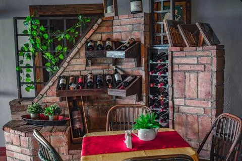 Wine rack in dominican tipical authentic restaurant Stock Photos