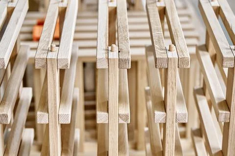 Wine rack of solid oak in the workshop closeup Stock Photos