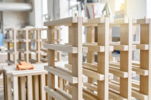 Wine rack of solid oak in the workshop closeup Stock Photos