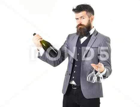 Wine tasting concept. Bearded man with long beard proposes wine tasting Stock Photos
