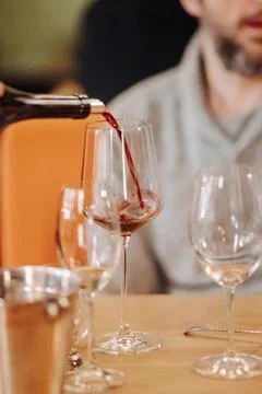 Wine tasting experience in the rustic cellar and wine bar: red wine glass and 스톡 사진