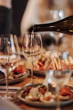 Wine tasting experience in the rustic cellar and wine bar: red wine glass and Stock Photos