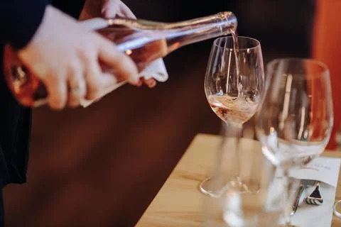 Wine tasting experience in the rustic cellar and wine bar: red wine glass and Stock Photos