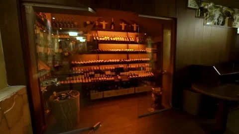 Wine vault at the restaurant. Moving camera. Slow motion Видео 104018132