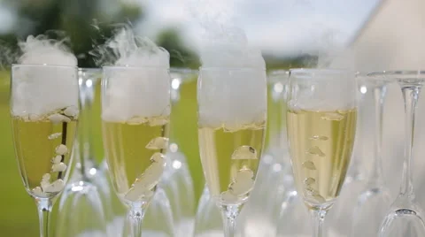 Wineglasses with nitrogen champagne Stock Footage 65021133