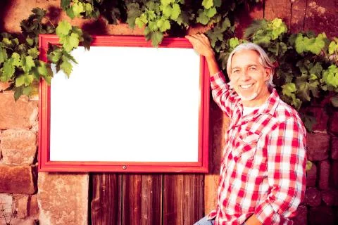 Winemaker With Billboard 스톡 사진