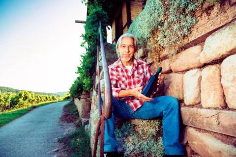 Winemaker Sitting By His Cottage Stock Photos